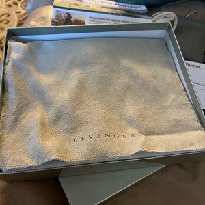 Levenger BRAND NEW IN BOX, junior size leather softfolio. Beautiful blue color.